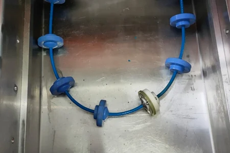 Bend section for tubular cable conveyor