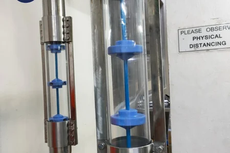 Inspection window for tubular cable conveyor